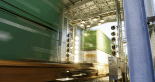 At NS, each Digital Train Inspection Portal features a setup of 24-megapixel trackside cameras and stadium lighting to capture “ultra-high-resolution” 360-degree images of passing railcars. (Norfolk Southern Photograph)